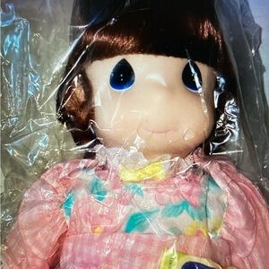 Summer Megan Precious Moment 1994
15”  Floral Patterned Fabric